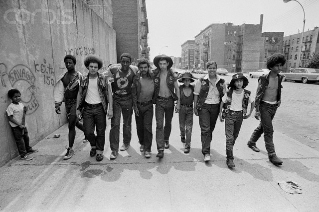 July 1972, The Bronx, New York City, New York State, USA --- Members of the New York street gang Savage Skulls. The trademark of the, primarily Puerto Rican, gang was a sleeveless denim jacket with a skull and crossbones design on the back. Based around Fox Street, in the popular South Bronx neighbourhood, the gang declared war on the drug dealers that operated in the area. Running battles were frequent with rival gangs Seven Immortals, and Savage Nomads. Image by © JP Laffont/Sygma/Corbis